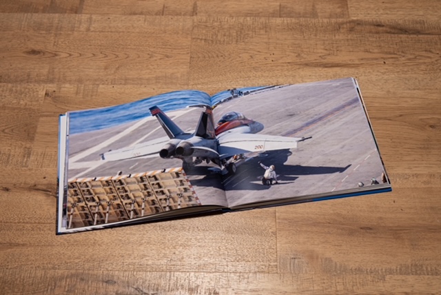 a page of our book with a fighter jet on it