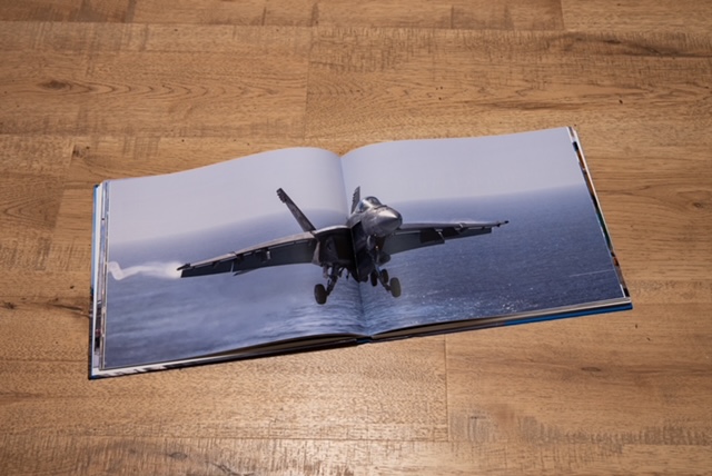 a page of our book with a fighter jet on it